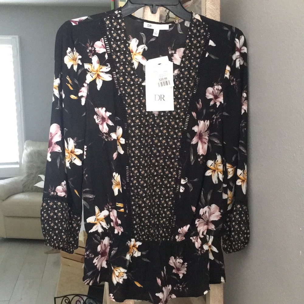 Black floral blouse. Nicely fitted to body